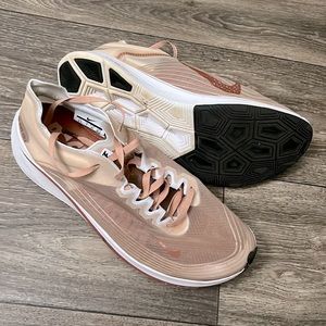 Nike zoom fly racing sneakers